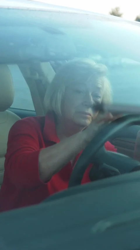 A Focused and Responsible Driver Who Is Demonstrating Safe and Considerate Stock Footage 303779682