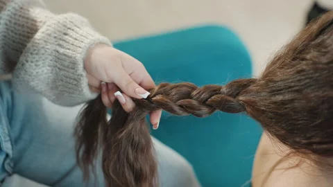 Focused Apprentice Expert In Hair Plaiting Technique, Diligent Student Video stock 323926768