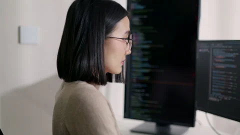 Focused Asian Female Programmer Coding in Modern Office. Stock Footage 300246472