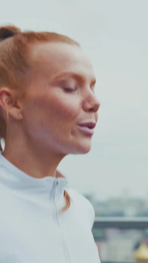 A Focused Athlete in Motion: Capturing the Determination and Grace of a Female Stock Footage 319062622