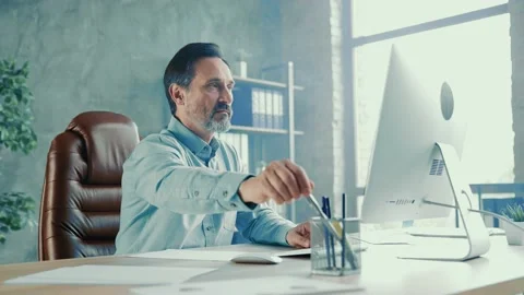 Focused attentive smart worker find interesting detail take note Video stock 161420158