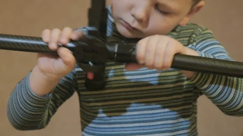 The focused boy trying to connect details Stock Footage 74362857
