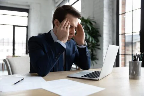Focused businessman pondering on problem, thinking hard Foto stock