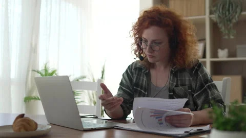 Focused call center agent working remotely from home Stock Footage 333261706