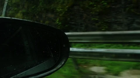Focused Car Rearview Mirror during a Rainy Day on the Freeway 스톡 동영상 91293598