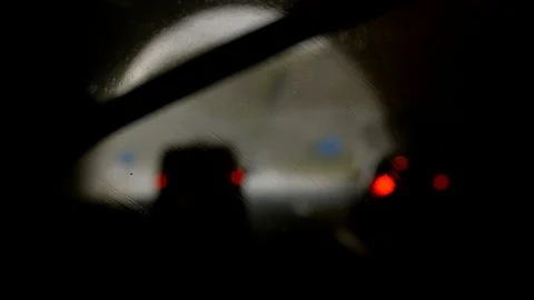 Focused Car Windshield Wipers during a Deluge. Slow Motion Stock Footage 90777964