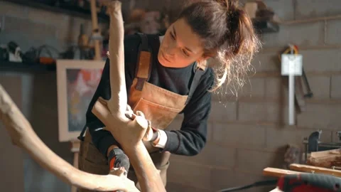 Focused carpenter checking quality of wood in workshop Stock Footage 167421057