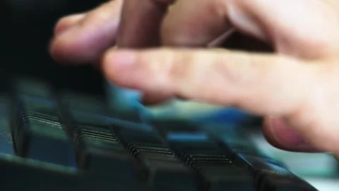 Focused Close-Up of Hands Typing on a Keyboard in a Professional Office Setting Stock-Footage 297369378