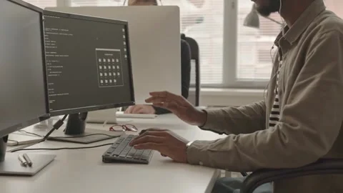 Focused Coder in Action Stock Footage 320912426