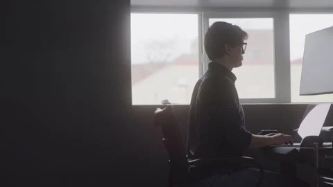 Focused Coding Technician at Work at His Desk Stock Footage 208785452