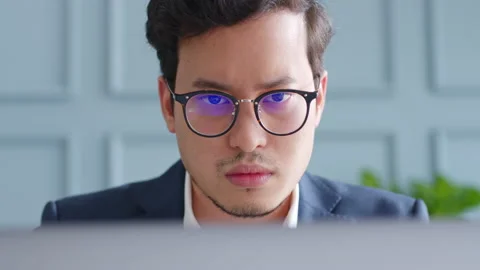 Focused concentrated businessman working with computer laptop seriously Video stock 147400351