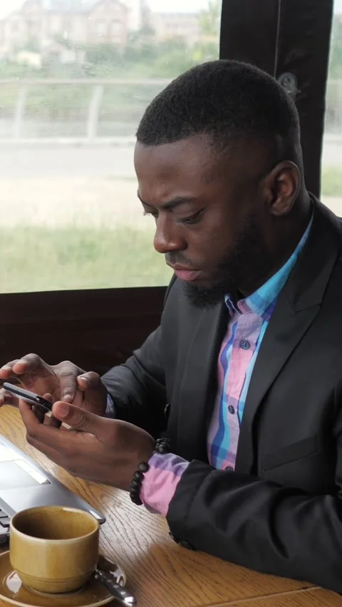 Focused Digital Multitasking. Business Owner Concentrating Amidst Technology Stock-Footage 333240490