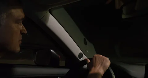 Focused driver looking through tunnel road Stock Footage 264929075