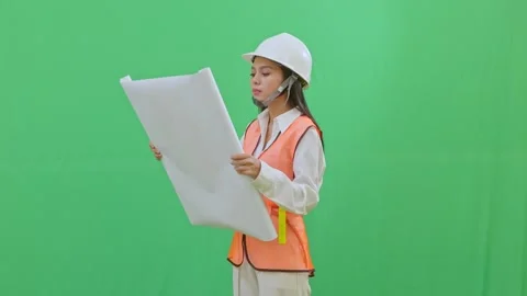Focused Engineer Unrolling Blueprints Inspection 스톡 동영상 331152252