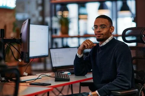Focused Excellence: An African American Programmer Tackles Challenges in a 写真素材