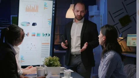 Focused executive manager man explaining management strategy using presentation Stock Footage 155803684