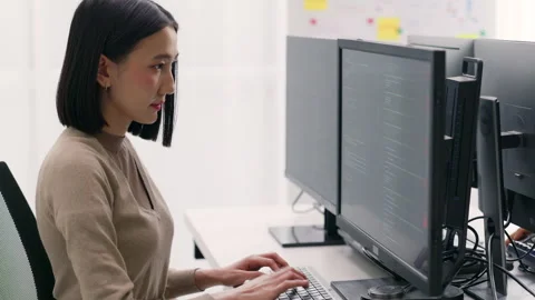 Focused Female Programmer Coding in Office. Stock Footage 310589376