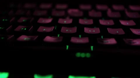 Focused Gaming Keyboard With Backlight Effect Close-Up Selective Focus Stock Footage 141162041