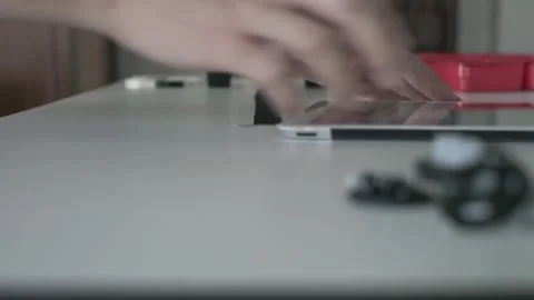 Focused Hands on a Digital Tablet Stock Footage 318863261