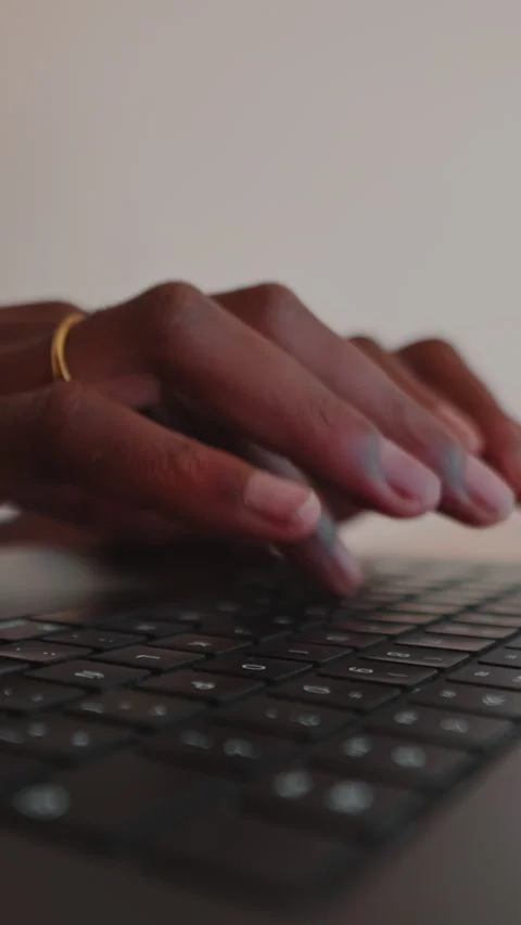 Focused Hands Typing on a Laptop Keyboard Stock Footage 332684071