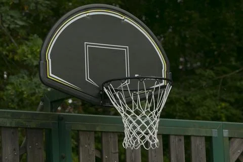 Focused image capturing basketball hardware and textured backboard Stock Photos
