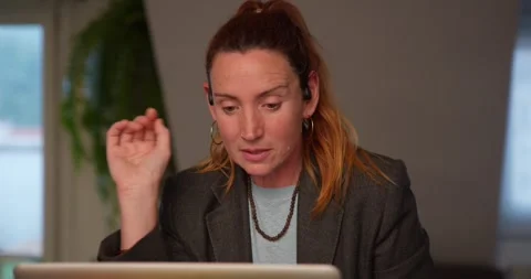 A focused individual, deeply engrossed in their work. Stock Footage 334776092