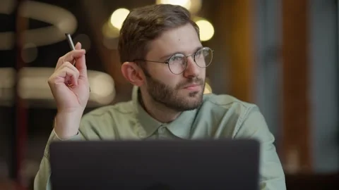 Focused Individual Engaged with Technology: A Deep Dive into Digital Stock Footage 344799927
