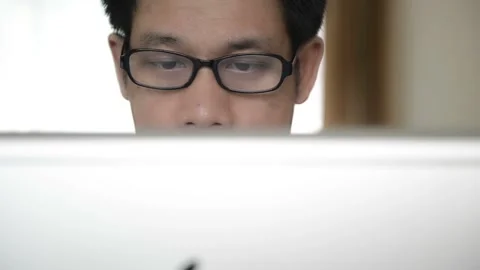 Focused Individual Working on a Laptop Stock Footage 315115864