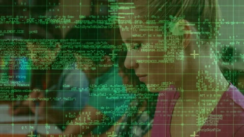 Focused individuals working on computers with green coding overlay in school Stock Footage 303527770