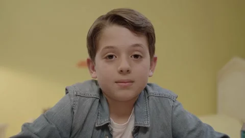 Focused kid using invisible touchscreen. Touching the screen. Video stock 198332768