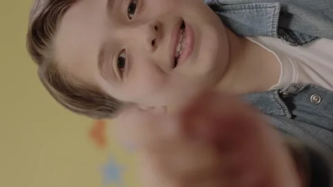 Focused kid using invisible touchscreen.... | Stock Video | Pond5