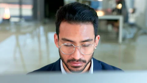 Focused male copywriter writing a script using a computer inside an office 스톡 동영상 201643554