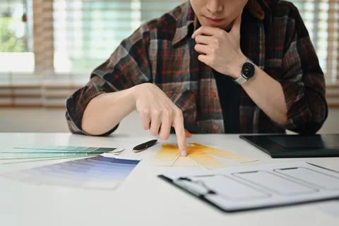 Focused male website developer planning application development for web mobile Stock Photos