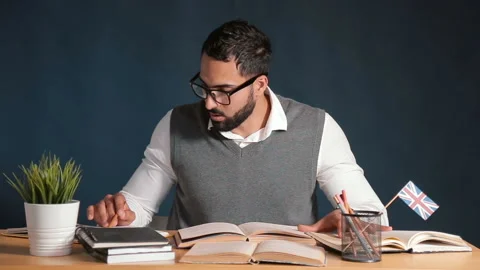 Focused Man Studies Stock-Footage 90035286