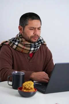 Focused Man Typing on Computer at Desk Stock Photos