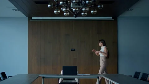 Focused manager solving problem alone. Frustrated businesswoman walking room Stock Footage 208641546