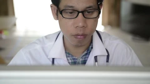 Focused Medical Professional Working on a Computer Stock Footage 315115870