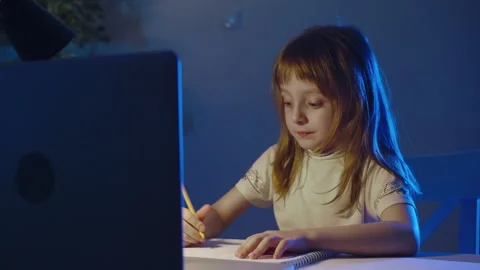 Focused Preschool child Studying at Table With Laptop Computer. Little Girl Video stock 273694073