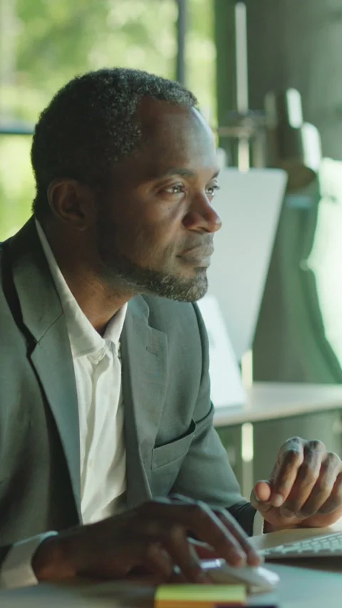 A Focused Professional Effectively Working in a Modern Office Environment That Stock Footage 314208844
