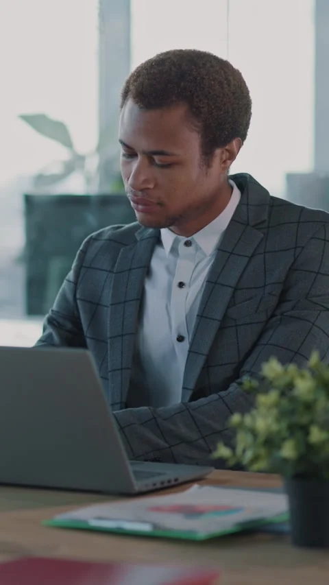 A Focused Professional Excelling While Working in a Modern Office Environment Stock Footage 313793529