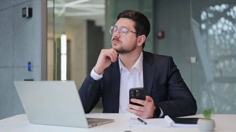 Focused Professional Works With Technology, Feeling Thoughtful And Dedicated Stock-Footage 330386382