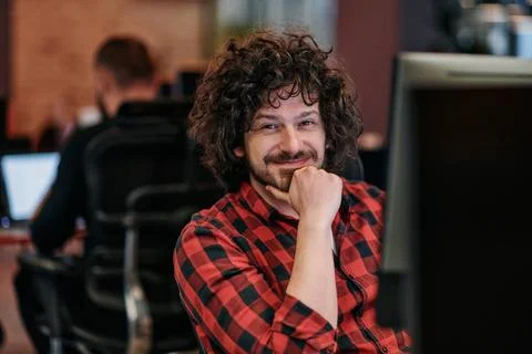 Focused Programmer With Afro Hairstyle in Plaid Shirt Working on Computer ... Stock-Fotos