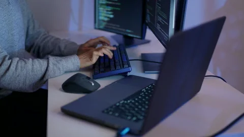 Focused Programmer Coding Late Night in Modern Office. Stock Footage 300246754