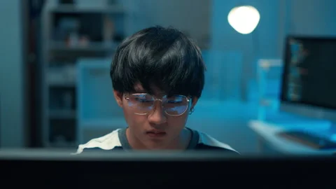 Focused programmer coding software backend system task engineer logic Stock Footage 313808487