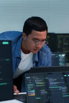 Focused Programmer Working on Digital Code 스톡 사진