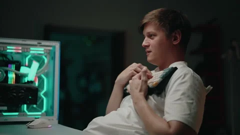Focused programmer working remotely, typing on mechanical keyboard during late Stock Footage 317166167