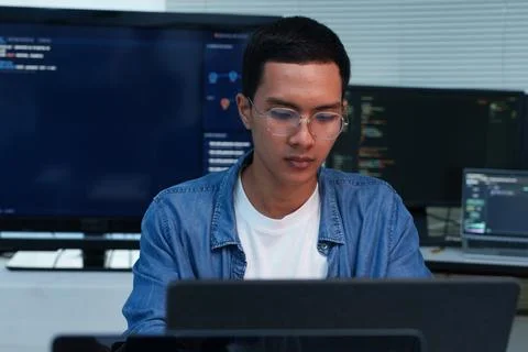 Focused Programmer Working on Software Development Stock Photos
