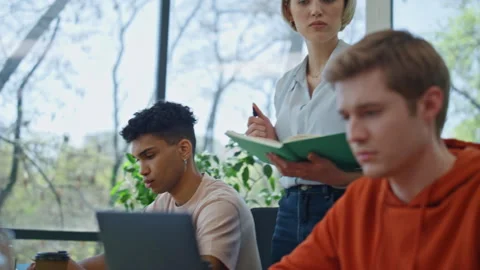 Focused programmers typing laptop window workplace closeup. Team collaborating Stock Footage 251835575
