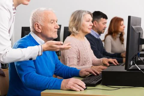Focused senior man during computer classes 写真素材
