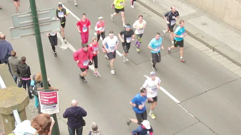 Focused shot of People running at half Marathon event Stock Footage 36989989
